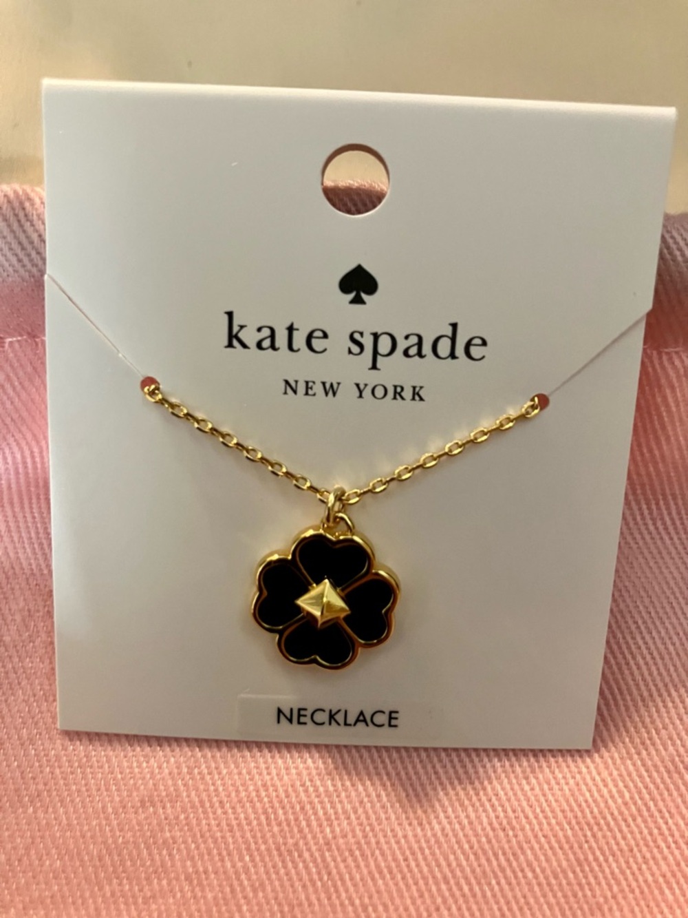 kate spade black and gold clover necklace with matching stud earrings